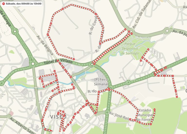 Map of a walking route in Viseu, Portugal, shown as a red dashed line looping through streets and parks.